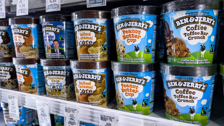 Ben and Jerry's brand ice cream containers for sale at a local supermarket aisle