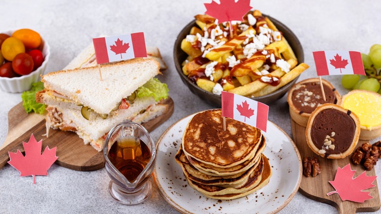 Various well-known Canadian foods with Canadian flags on top