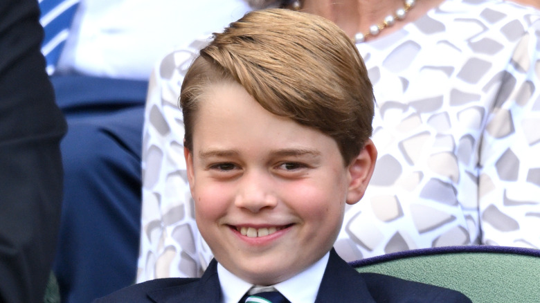 A close-up of Prince George smiling